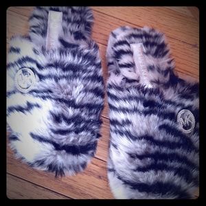 Michael Kors slippers.
